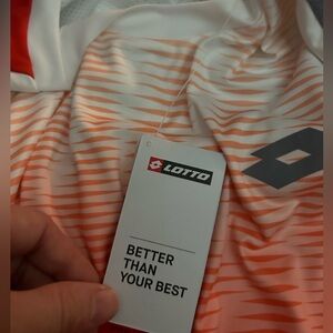 Men’s Athletic Tennis Shirt by Lotto in size S. never worn